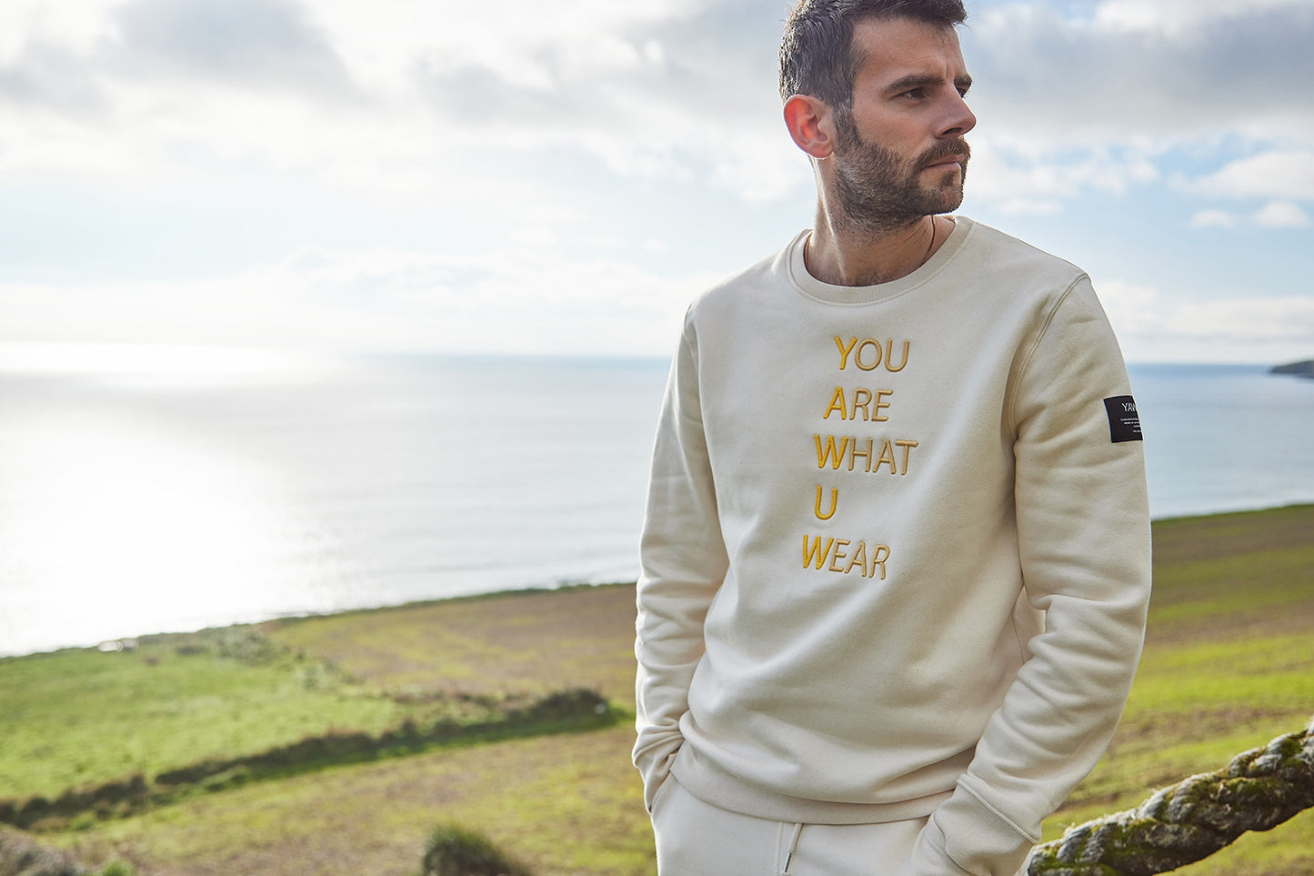 Mens ivory semi fitted crewneck sweatshirt, made ethically from organic cotton and recycled polyester. 